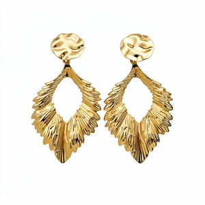 Elegant gold textured leaf dangle earrings with a modern crinkled metallic finish.