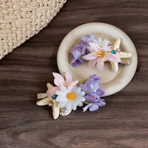 Exquisite French style floral hair clips with fabric flowers and resin starfish motifs