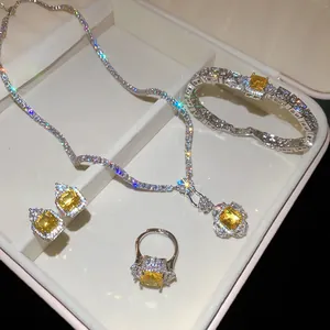 Detail view of luxury yellow zircon jewelry set including necklace, bracelet and ring