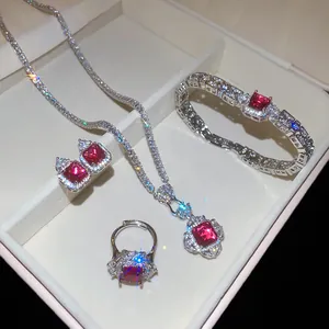 Detailed view of luxury square red gemstone jewelry set with necklace and ring