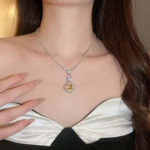 Elegant luxury necklace featuring a square yellow zircon pendant on a sparkling tennis chain