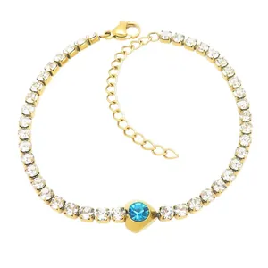 Elegant gold-plated titanium steel tennis bracelet with blue heart zircon centerpiece.
