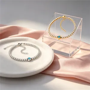 Close-up of gold and silver heart-shaped blue zircon bracelets on display
