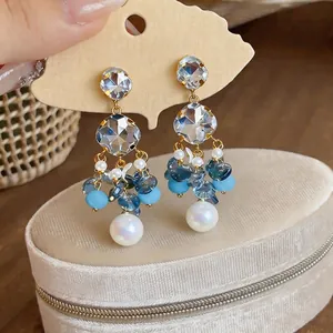 Elegant long tassel beaded earrings featuring sparkling blue crystals and pearls for women