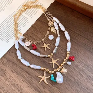 Elegant multi-layer necklace with pearls, starfish and shell charms for vacation
