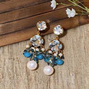 Elegant ethnic blue beaded drop earrings with large faceted crystals and pearls.