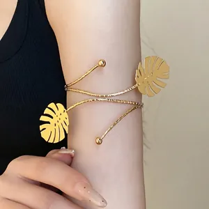 Elegant gold metal monstera leaf armlet cuff bracelet for fashion-forward women stylish