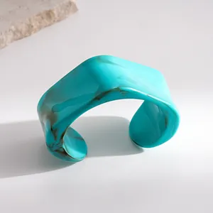 Detail macro view of the vintage marbled turquoise resin cuff bracelet with glossy finish