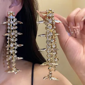 Elegant silver needle tassel earrings with sparkling rhinestones in high-end design