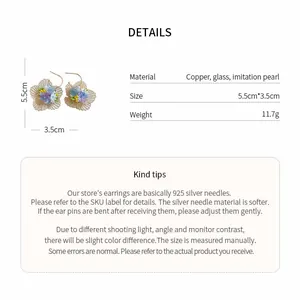 Spécifications détaillées avec dimensions et matériaux pour ces boucles d'oreilles fleurs