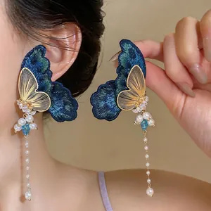 Exquisite embroidered butterfly earrings with white pearl tassels and zircon accents