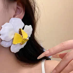 Vintage-style white and yellow enamel flower stud earrings with 925 silver pins