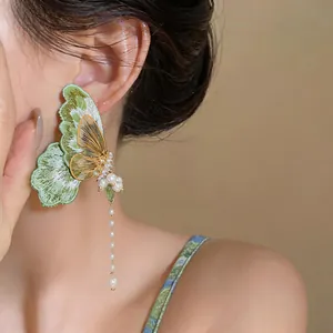 Exquisite green butterfly embroidery earring featuring elegant pearls and a long tassel