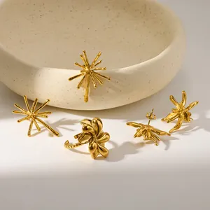 Juego de joyas artístico de acero inoxidable dorado con diseño de fuegos artificiales y anillo