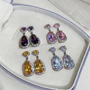 Elegant teardrop zircon earrings set in multiple colors with luxury palace style.