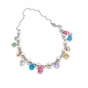 Asymmetric pearl necklace with colorful faceted crystal charms for a beach vacation