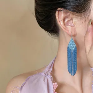 Blue diamond-shaped beaded long tassel earrings with delicate chain fringe detail