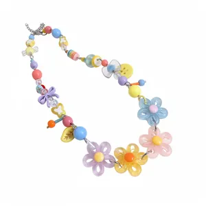 Colorful dopamine style daisy choker necklace with vibrant beads and floral charms