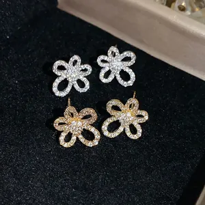 Sparkling 18k gold plated flower stud earrings with pave cubic zirconia stones