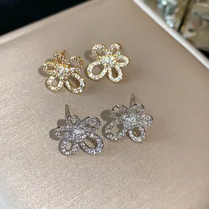 Exquisite 18k gold plated zircon flower stud earrings featuring elegant floral design for women