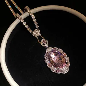 Elegant retro pink oval zircon pendant necklace featuring a shimmering tennis chain
