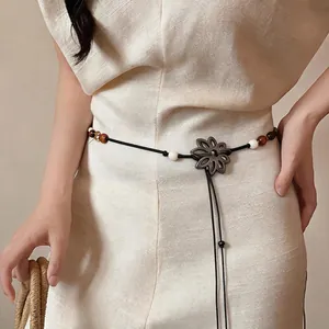 Bohemian style leather cord waist chain with wooden beads and coconut shell flower pendant