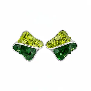 Geometric stud earrings featuring vibrant two-tone green crystals in a polished silver setting