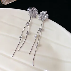 Elegant zircon flower tassel earrings with S925 silver needles in a minimalist style.