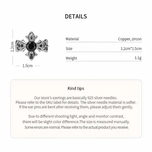 Detailed view of gothic zircon cross iris ear clip with size and material specs
