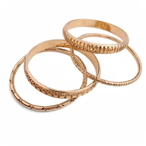 Elegant set of 4 rose gold geometric textured metal bangles for women jewelry gift