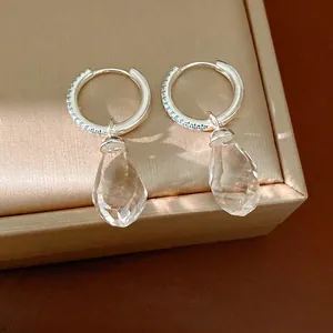 Elegant silver-toned zircon hoop earrings with faceted clear glass water-drop pendants
