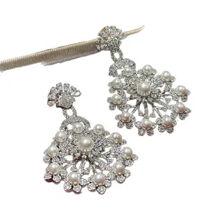 Elegant silver-tone flower drop earrings with white pearls and sparkling zircons