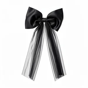 Elegant black satin bow hair clip with delicate long mesh tassels for women's hair styling