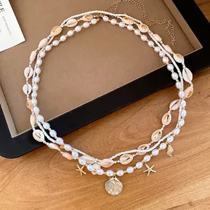 Bohemian pearl and shell waist chain with starfish pendants for beach resort wear