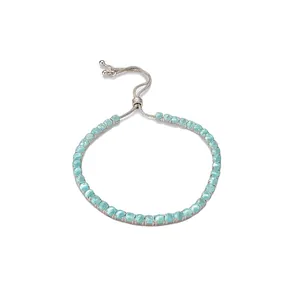 Elegante bracciale francese regolabile con zirconi blu menta e chiusura a coulisse