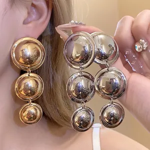 Elegant vintage glossy triple metallic sphere gold and silver drop earrings for women