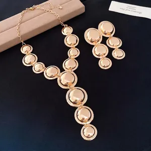 Vintage metallic round disc necklace and stud earrings set with high-polished gold finish