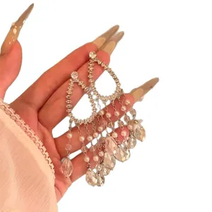 Exquisite silver-toned waterdrop tassel earrings with shimmering cubic zirconia crystals