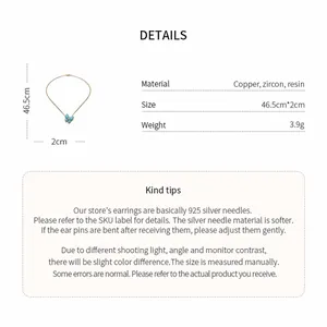 Close-up details of butterfly pendant necklace showing material and size specifications