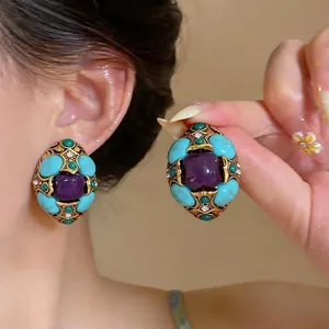 Eleganti orecchini vintage geometrici con pietre turchesi e viola in montatura dorata