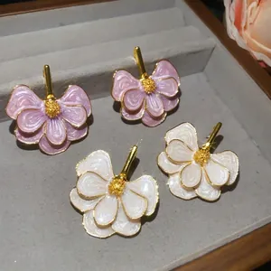 Elegant floral stud earrings with enamel petals and gold-tone finish for women's gift