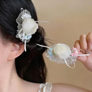 Elegant chiffon rose hair clip with lace and pearl details for French style hair styling