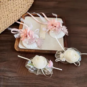 Elegant chiffon flower hair clips with exquisite butterfly and pearl accents for women
