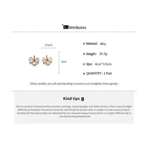 Detailed product specifications and dimensions for white enamel flower stud earrings