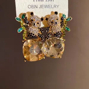 Exquisite silver needle panda earrings with square rhinestone pendants for women