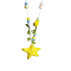 Handmade colorful dopamine beaded necklace with a vibrant yellow starfish pendant
