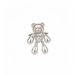 Elegant silver teddy bear open ring featuring a sparkling zircon heart and dangling limbs.