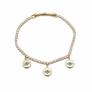 Elegant 18k gold plated tennis bracelet featuring sparkling zircon and blue evil eye charms