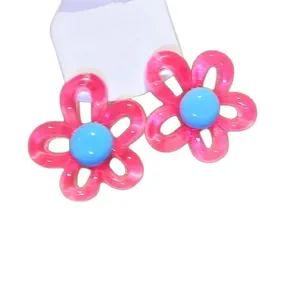 Cute pink resin flower stud earrings with blue centers in a minimalist Korean style design