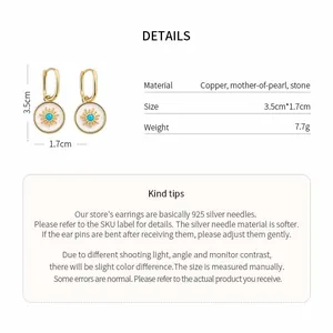 Detail view of gold plated mother-of-pearl flower earrings with measurements and specs